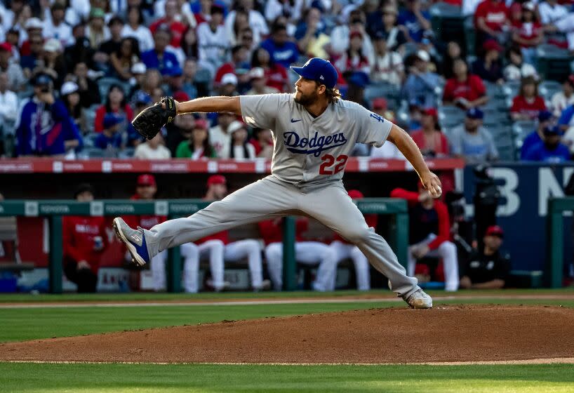 ANAHEIM, CA - JUNE 20, 2023: Los Angeles Dodgers starting pitcher Clayton Kershaw (22) pitches against the Angels in the first inning at Angel Stadium on June 20, 2023 in Anaheim, California.  (Gina Ferazzi/Los Angeles Times)