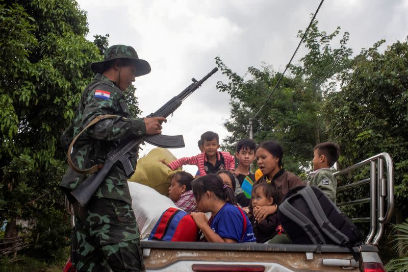 FILE PHOTO: Resistance fighters rescue civilians trapped amid airstrikes in Myanmar