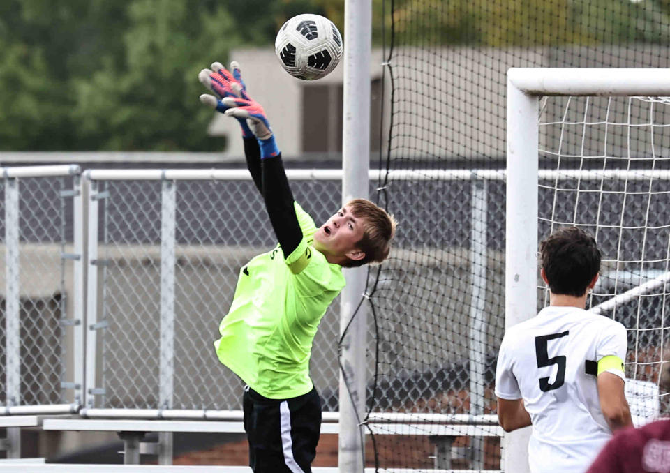 McNicholas goalie Carson Zurmehly (1) reaches for the ball during their soccer game against Turpin Saturday, Oct. 1. The Rockets now have a tall order against Wyoming in the Division II regional semifinal.