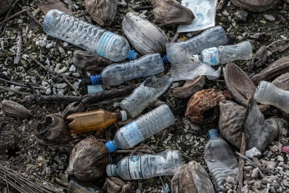 HITHADHOO, MALDIVES - DECEMBER 14: Plastic waste litters the shoreline in Koattey wetlands on December 14, 2019 in Hithadhoo, Maldives. The neighbouring Koattey and Eydhigali Kilhi wetlands are among the largest wetlands in the Maldives and have become integral to the countrys EU and Australia-funded Climate Change Adaptation Project to preserve and manage the wetlands and utilise them as a natural defence against floods and rising seas. The wetlands can store several tens of million cubic meters of water, act as barriers against rising sea levels and flooding caused by extreme weather events, they also contribute to waste water management, groundwater recharge, freshwater storage, and purify water that flows through their systems. Plants found here are critical in controlling erosion. Along with coral reefs, wetlands are the primary defence that a small island nation like the Maldives has against climate change. (Photo by Carl Court/Getty Images)