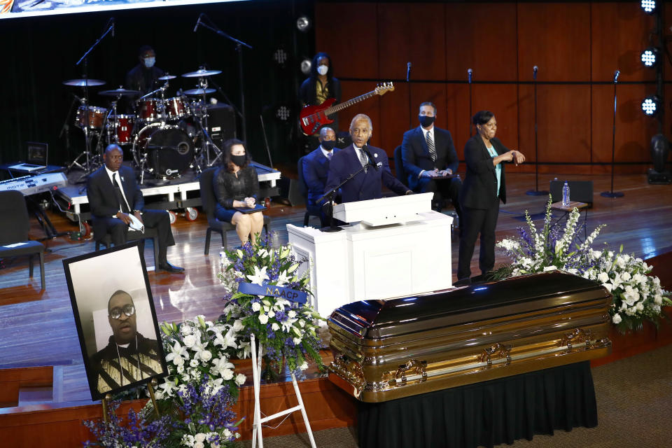 The Rev. Al Sharpton speaks at a memorial service for, George Floyd at North Central University Thursday, June 4, 2020, in Minneapolis. (AP Photo/Julio Cortez)