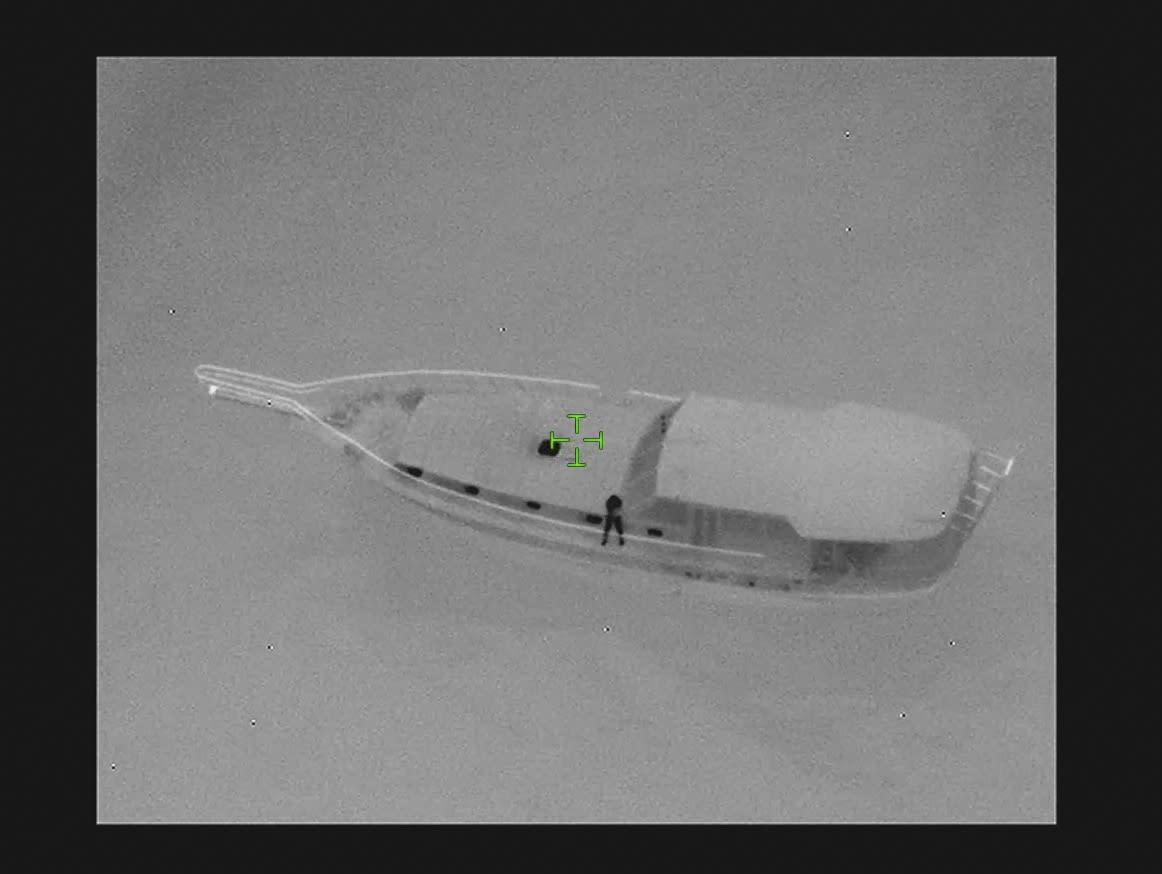 A picture taken by a thermal camera of a FRONTEX (European Border and Coast Guard Agency) airplane, Saturday, Feb. 25, showing the boat that later shipwrecked off the Italian shore of Cutro. Nearly 70 people died in last week's shipwreck on Italy's Calabrian coast. The tragedy highlighted a lesser-known migration route from Turkey to Italy for which smugglers charge around 8,000 euros per person. (FRONTEX via AP, File)