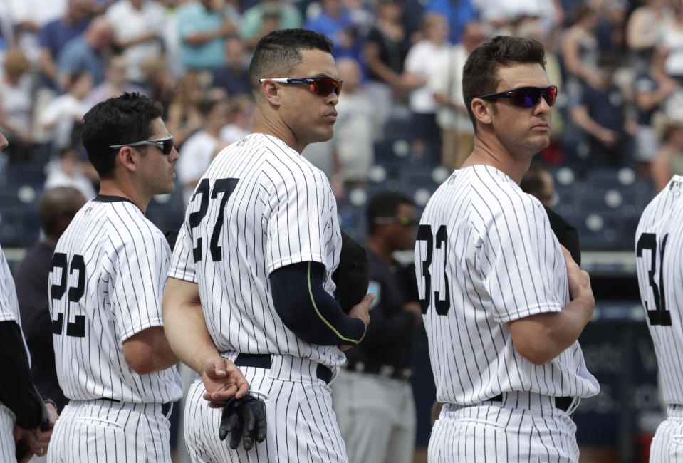 New York Yankees’ Jacoby Ellsbury (22), Giancarlo Stanton (27) and Greg Bird (33) (AP Photo/Lynne Sladky)