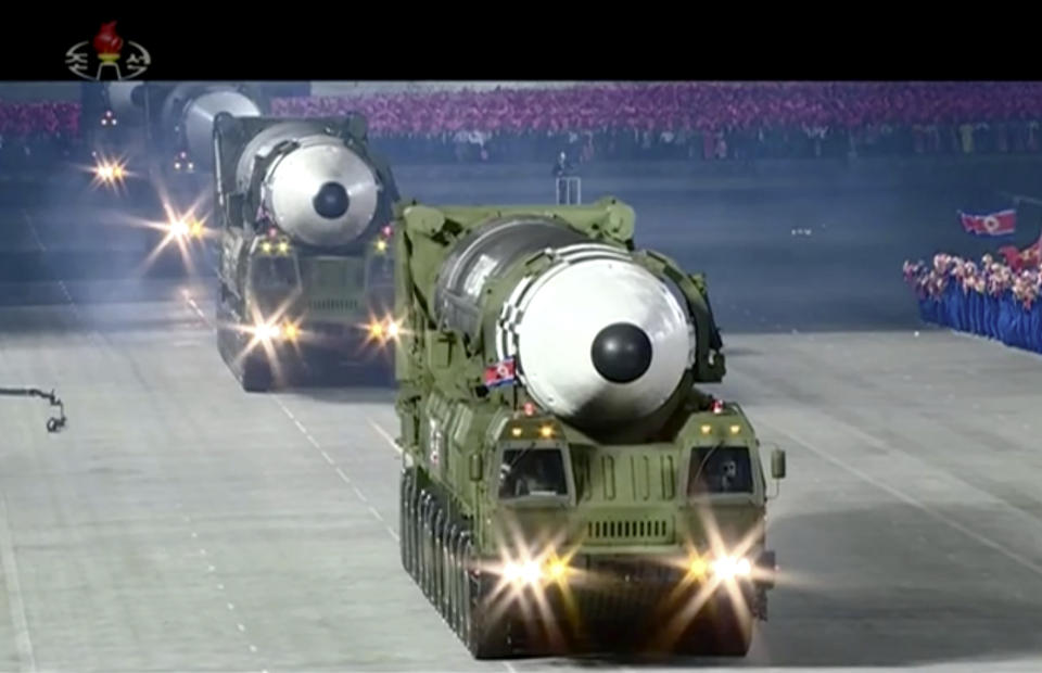 This image made from video broadcasted by North Korea's KRT, shows a military parade with what appears to be a possible new solid-fuel missile at the Kim Il Sung Square in Pyongyang, Saturday, Oct. 10, 2020. North Korean leader Kim Jong Un warned Saturday that his country would “fully mobilize” its nuclear force if threatened as he took center stage at a massive military parade to mark the 75th anniversary of the country’s ruling party. (KRT via AP)