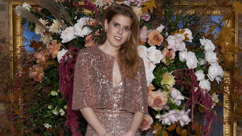 Princess Beatrice wearing a sequined Monique  Lhuillier gown for opening of boutique