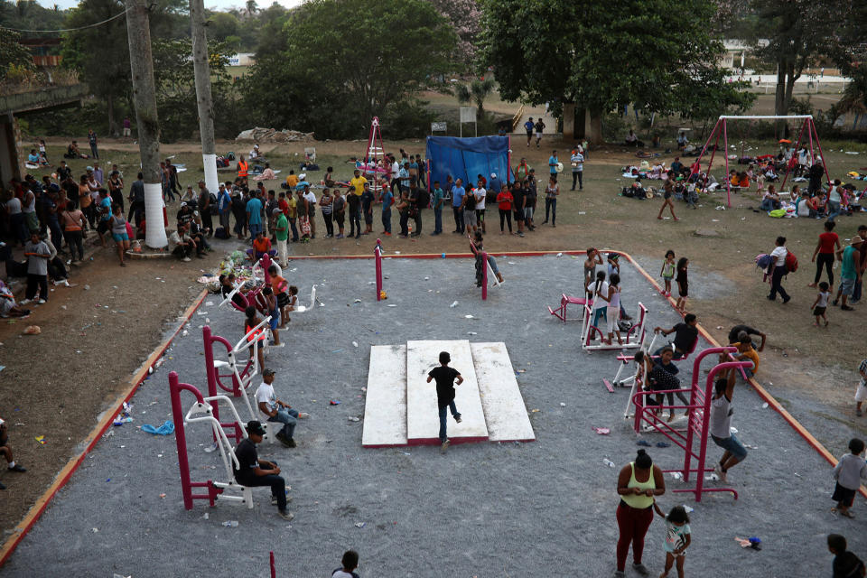 <p>Central American migrants participating in the Migrant Stations of the Cross caravan or “Via crucis,” set up camp at a sports center during the caravan’s few-day’s stop in Matias Romero, Oaxaca state, Mexico, late Monday, April 2, 2018. (Photo: Felix Marquez/AP) </p>