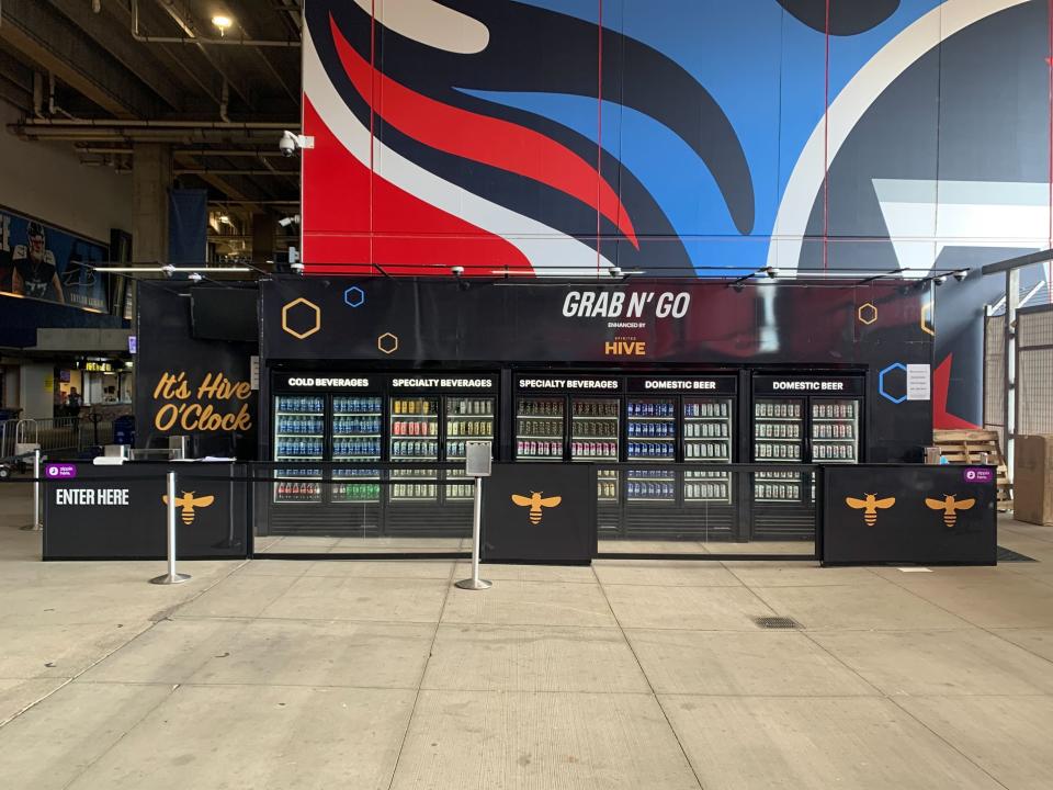 This concessions lane at Nissan Stadium in Nashville is powered by Zippin to provide a cashier-less experience for fans at Tennessee Titans game. Customers scan their credit card, and AI technology monitors the items selected from shelves to charge them appropriately.