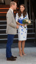 <p>For a tour of Luton’s charities and hospices, Kate donned an old L.K. Bennett favourite: a simple white dress finished with a regal blue poppy print. Nude heels complemented the look perfectly.</p><p><i>[Photo: PA]</i></p>