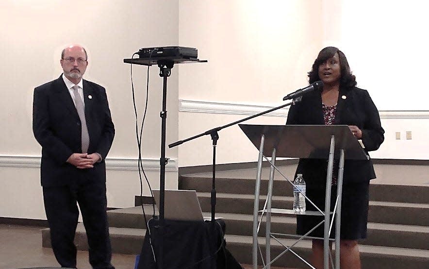 MDHS Inspector General Sandra Griffith, right, welcomes guests to New Horizon Church Feb. 20 as Executive Director Robert G. “Bob” Anderson looks on.