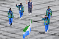 <p>Sierra Leone paid homage to the flag in blue, green and white patterned sweatsuits. </p>