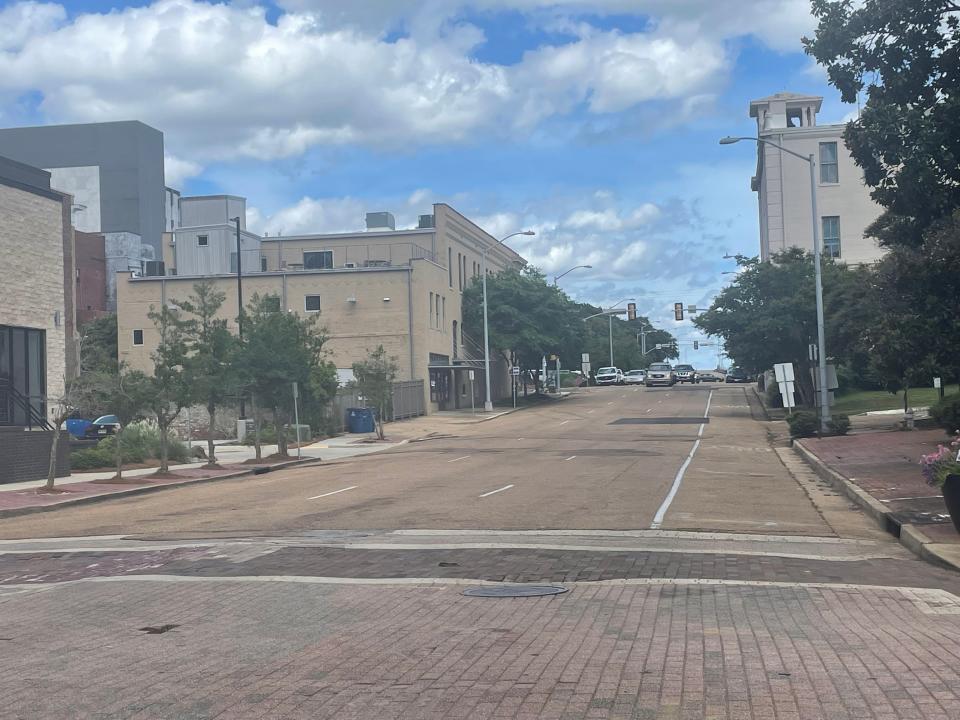 The gravel of E. Pearl Street creates a brown color on the street in downtown Jackson.