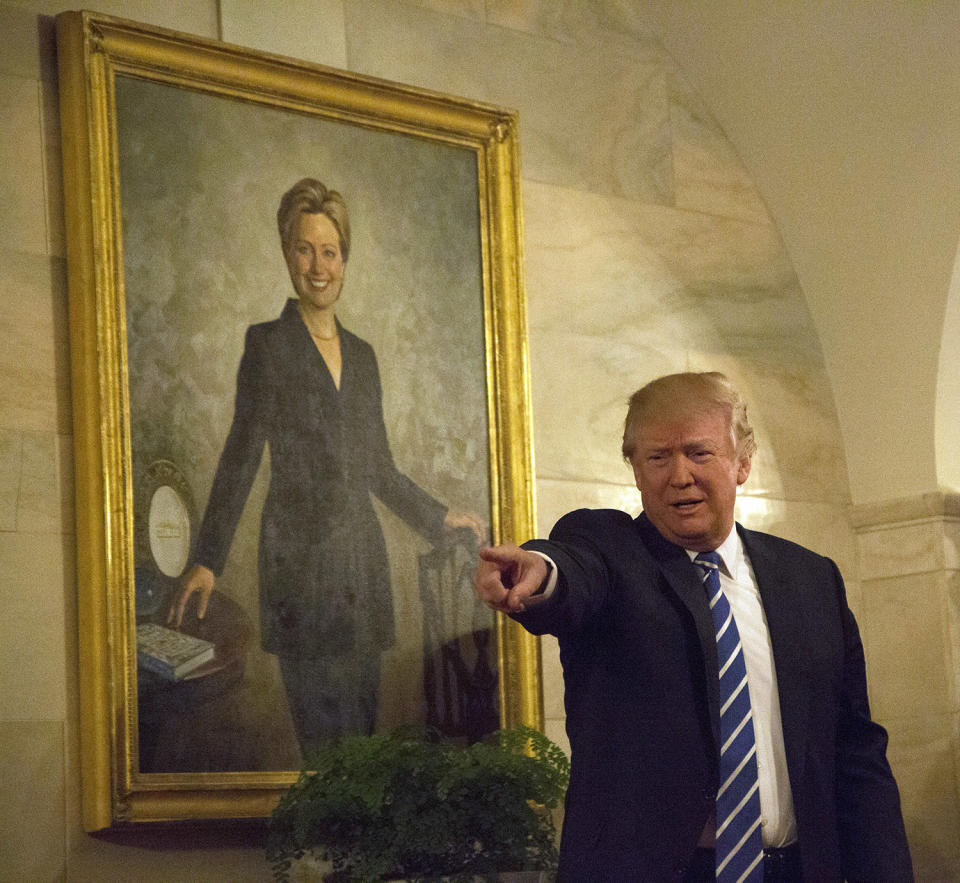 President Donald Trump greets visitors In at White House