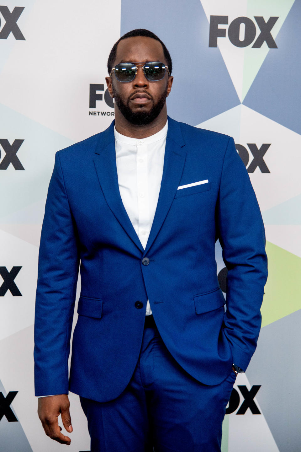 Diddy Wearing Blue Suit