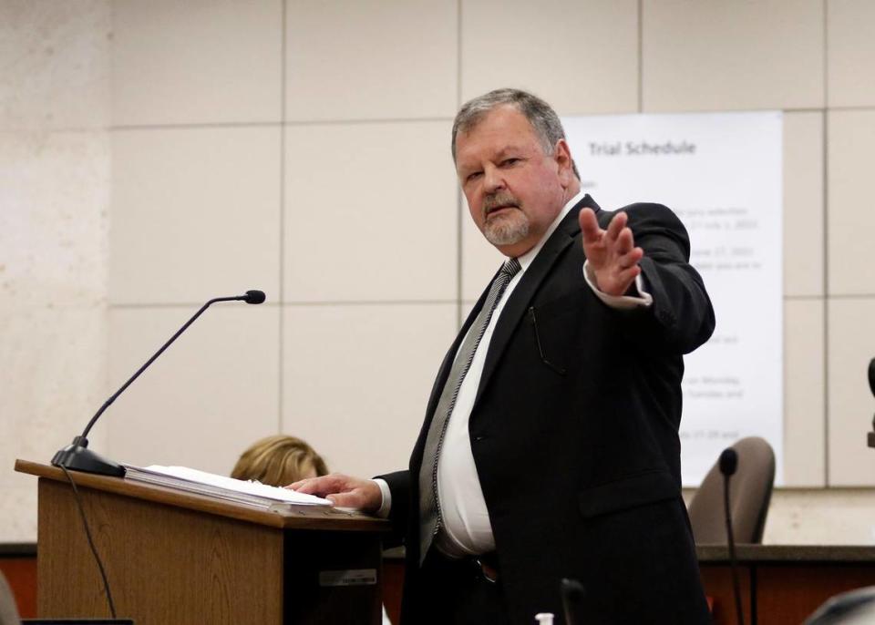 Harold Mesick, Ruben Flores’ defense attorney, gestures toward his client as he conducts his closing arguments at Monterey Superior Court in Salinas on Wednesday, Oct. 5, 2022.