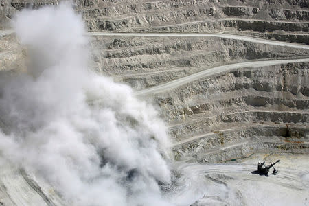 FILE PHOTO - Dynamite explosions blast rock mass at the La Escondida copper mine near Antofagasta, some 1,545 km (980 miles) north of Santiago city and 3,100 meters (10,170 feet) above sea level in Chile on March 31, 2008. REUTERS/Ivan Alvarado/File Photo