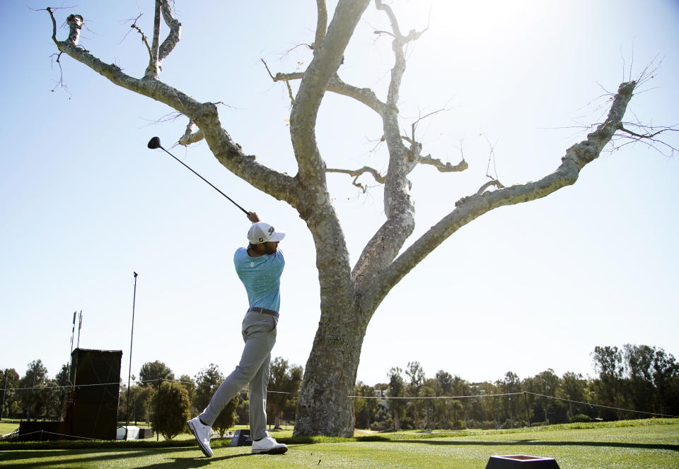 Max Homa tees off on the third hole during the final round of the Genesis Invitational golf tournament at Riviera Country Club, Sunday, Feb. 21, 2021, in the Pacific Palisades area of Los Angeles. (AP Photo/Ryan Kang)