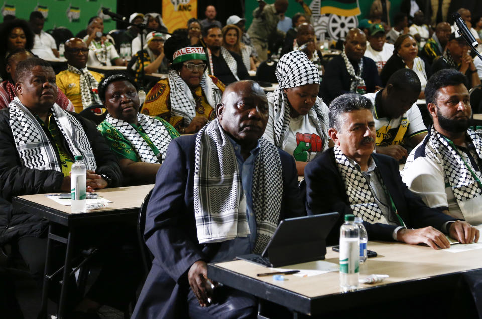 South African President Cyril Ramaphosa, first row left, listens in Johannesburg, Friday, Jan 26, 2024 to the ruling from the top U.N. court that harshly criticized Israel's war against Hamas. Israeli Prime Minister Benjamin Netanyahu says Israel will "continue to do what is necessary" to defend itself. (AP Photo)