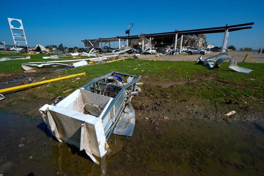 A gas pump rests in a ditch the morning after a tornado rolled through, Sunday, May 26, 2024, in Valley View, Texas. Powerful storms left a wide trail of destruction Sunday across Texas, Oklahoma and Arkansas after obliterating homes and destroying a truck stop where drivers took shelter during the latest deadly weather to strike the central U.S. (AP Photo/Julio Cortez)