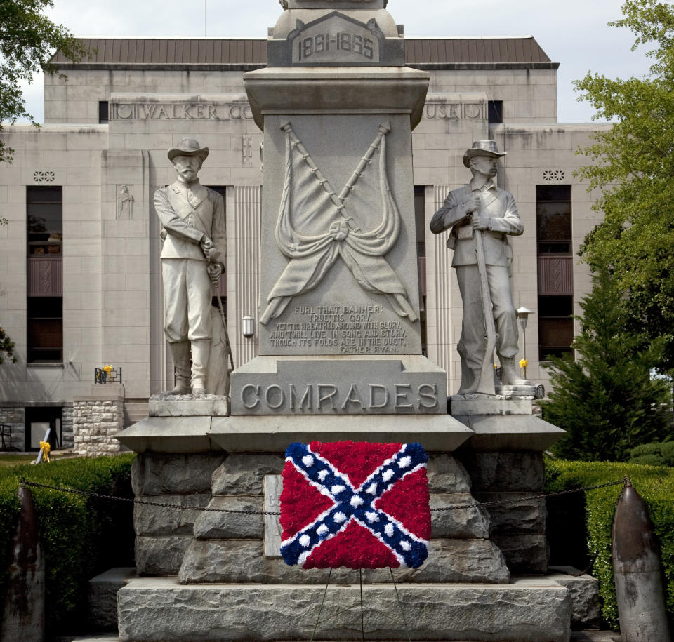 A&nbsp;Confederate memorial, with an added Confederate flag made out of flowers, is shown in Jasper, Alabama, in 2010. (Photo: Buyenlarge via Getty Images)