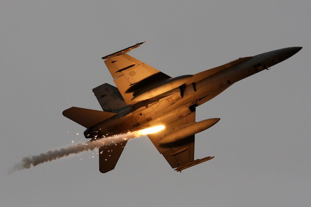 raaf fa 18a hornet deploys flare near williamtown airbase