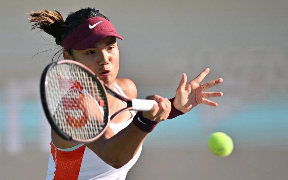 Emma Raducanu of Britain returns the ball against Moyuka Uchijima of Japan  - AFP