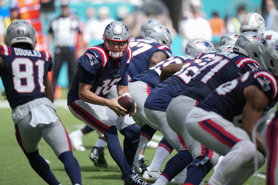 New England Patriots quarterback Mac Jones (10) looks to make a play during the first half of an NFL football game against the Miami Dolphins, Sunday, Oct. 29, 2023, in Miami Gardens, Fla. (AP Photo/Wilfredo Lee)