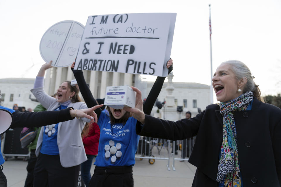 Abortion-rights activists rally outside of the Supreme Court, Tuesday, March 26, 2024, in Washington. The Supreme Court is hearing arguments in its first abortion case since conservative justices overturned the constitutional right to an abortion two years ago. At stake in Tuesday's arguments is the ease of access to a medication that was used in nearly two-thirds of all abortions in the U.S. last year. (AP Photo/Jose Luis Magana)