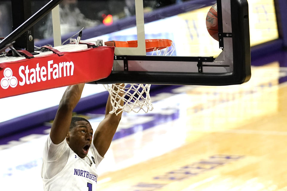 Northwestern guard Chase Audige reacts as he misses a dunk during the second half of an NCAA college basketball game against Rutgers in Evanston, Ill., Sunday, Jan. 31, 2021. (AP Photo/Nam Y. Huh)