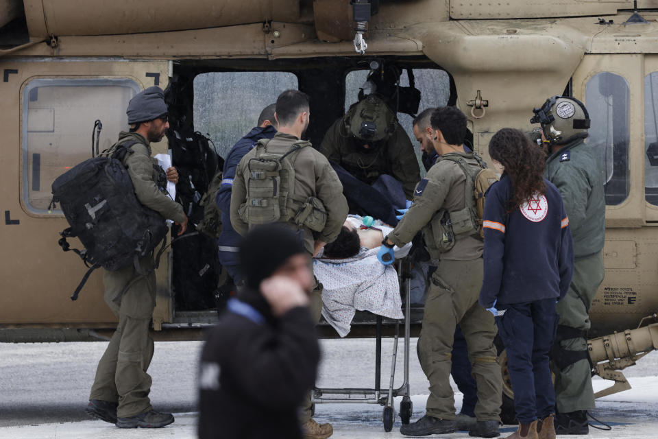 An Israeli medical team transports a person wounded by a rocket fired from southern Lebanon, at Ziv hospital in Israel's northern city of Safed, Feb. 14, 2024, amid ongoing cross-border tension as fighting continues between Israel and Palestinian Hamas militants in the Gaza Strip. / Credit: JALAA MAREY/AFP/Getty