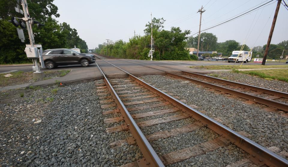 Building an overpass for the CSX railroad tracks at West Elm Street in Monroe was projected to cost less than doing an overpass at West Front Street and more beneficial than doing on at West Seventh Street.