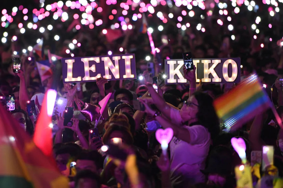 In this photo taken on April 23, 2022, supporters of Philippine Vice President and opposition presidential candidate Leni Robredo hold up lit mobile phones during a campaign rally coinciding with her birthday in Pasay, suburban Manila. (Photo by Ted ALJIBE / AFP) (Photo by TED ALJIBE/AFP via Getty Images)