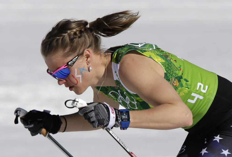 United States' Sadie Bjornsen skis during the women's 4x5K cross-country relay at the 2014 Winter Olympics, Saturday, Feb. 15, 2014, in Krasnaya Polyana, Russia. (AP Photo/Matthias Schrader)