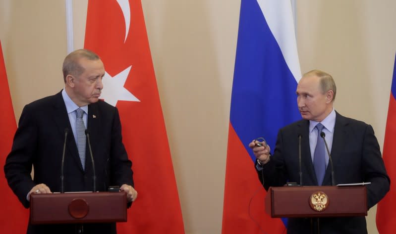 FILE PHOTO: Russian President Vladimir Putin meets with Turkish President Recep Tayyip Erdogan in Sochi