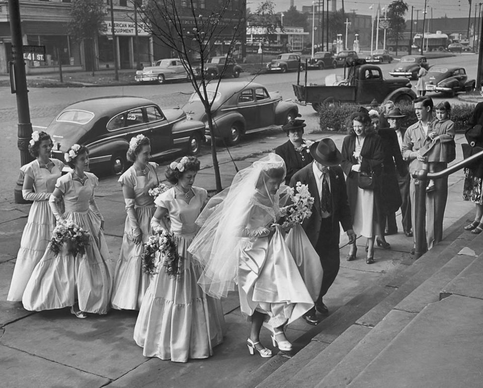 <p>Full skirt styles began popping up in bridal fashion by 1950. Sweetheart necks and cap sleeve gowns were some of the most popular styles you'd see walking down the aisle. </p>