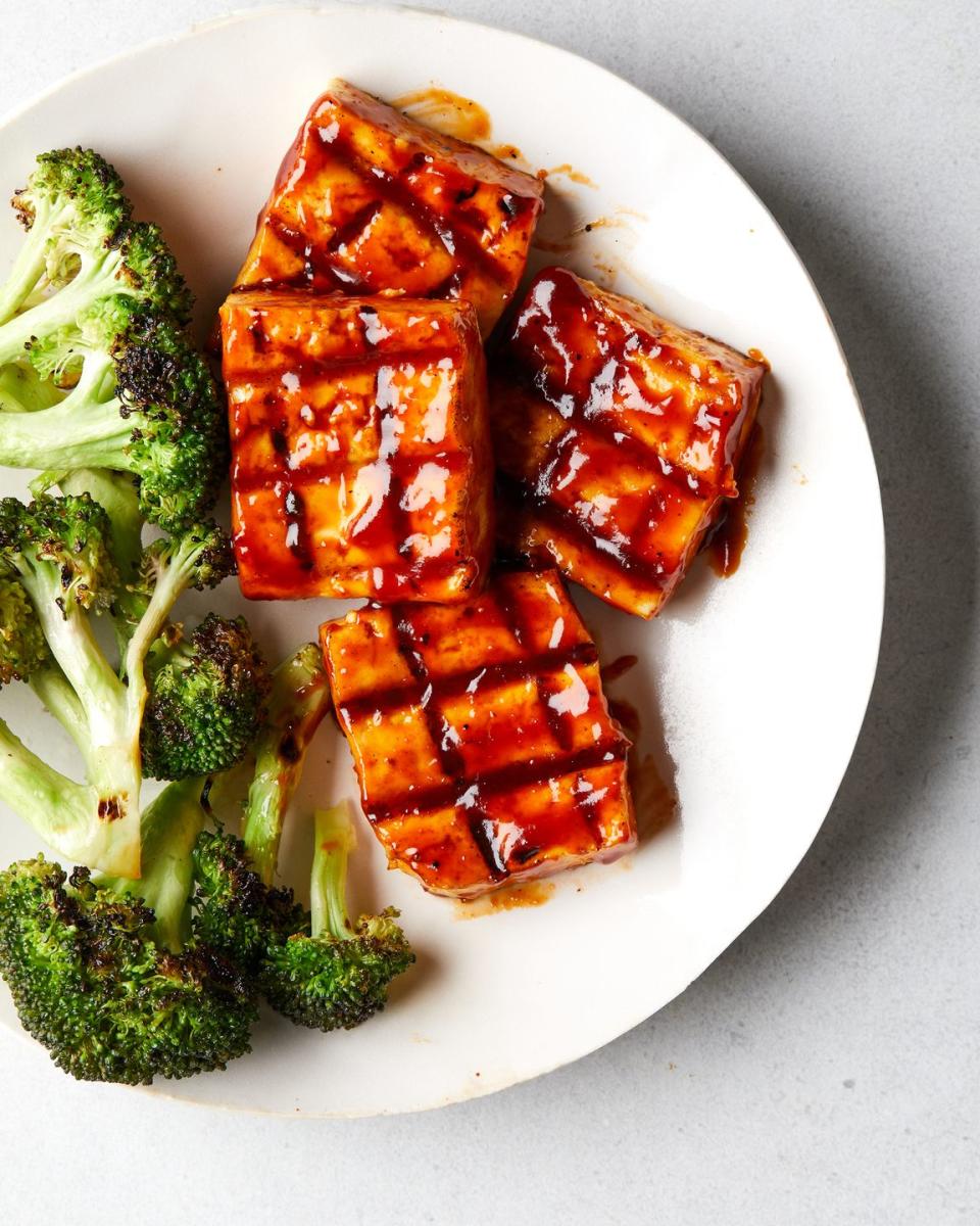 <p>Who needs meat? BBQ tofu isn't just for vegetarians and vegans. Be sure to serve the tofu with more of the spicy <a href="https://www.delish.com/cooking/g257/barbecue-sauce-recipes/" rel="nofollow noopener" target="_blank" data-ylk="slk:BBQ sauce;elm:context_link;itc:0;sec:content-canvas" class="link ">BBQ sauce</a> on the side, and it will compete with all your classics like <a href="https://www.delish.com/cooking/recipe-ideas/a39509942/bbq-brisket-recipe/" rel="nofollow noopener" target="_blank" data-ylk="slk:brisket;elm:context_link;itc:0;sec:content-canvas" class="link ">brisket</a>, <a href="https://www.delish.com/cooking/recipe-ideas/a39902284/grilled-short-ribs-recipe/" rel="nofollow noopener" target="_blank" data-ylk="slk:short ribs;elm:context_link;itc:0;sec:content-canvas" class="link ">short ribs</a>, and <a href="https://www.delish.com/cooking/recipe-ideas/recipes/a47360/bbq-grilled-chicken-recipe/" rel="nofollow noopener" target="_blank" data-ylk="slk:chicken;elm:context_link;itc:0;sec:content-canvas" class="link ">chicken</a>.</p><p>Get the <strong><a href="https://www.delish.com/cooking/recipe-ideas/a40087844/bbq-tofu-recipe/" rel="nofollow noopener" target="_blank" data-ylk="slk:BBQ Tofu recipe;elm:context_link;itc:0;sec:content-canvas" class="link ">BBQ Tofu recipe</a></strong>.</p>