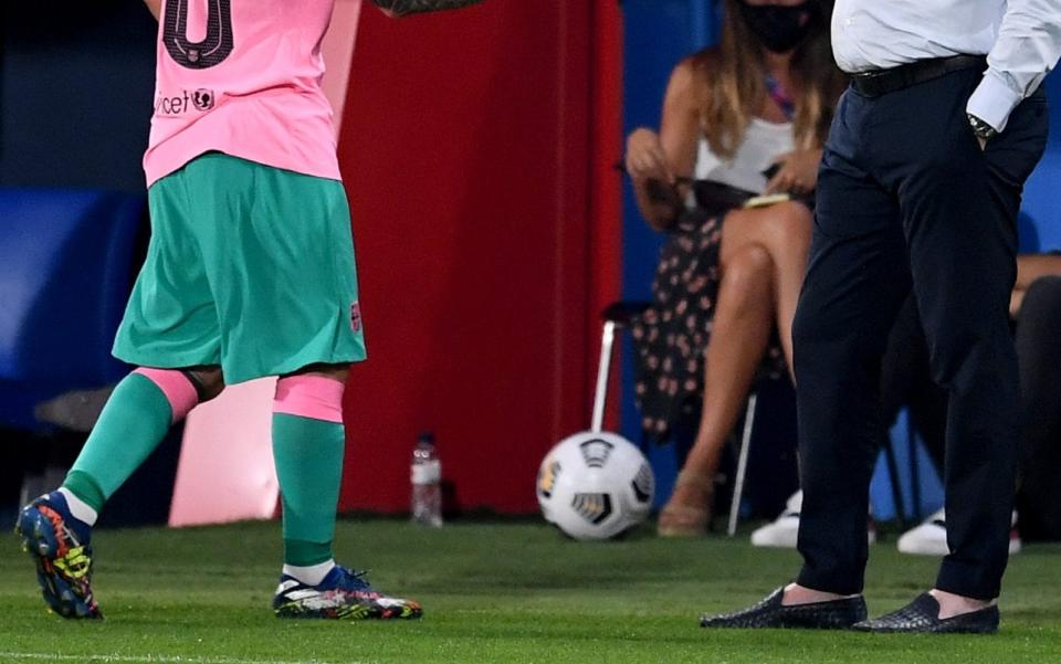 Detail of Messi and Koeman's legs and shoes - GETTY IMAGES