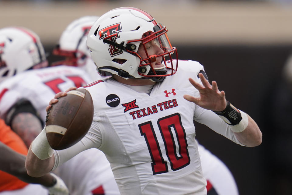 Texas Tech quarterback Alan Bowman (10) throws in the first half of an NCAA college football game against Oklahoma State in Stillwater, Okla., Saturday, Nov. 28, 2020. (AP Photo/Sue Ogrocki)