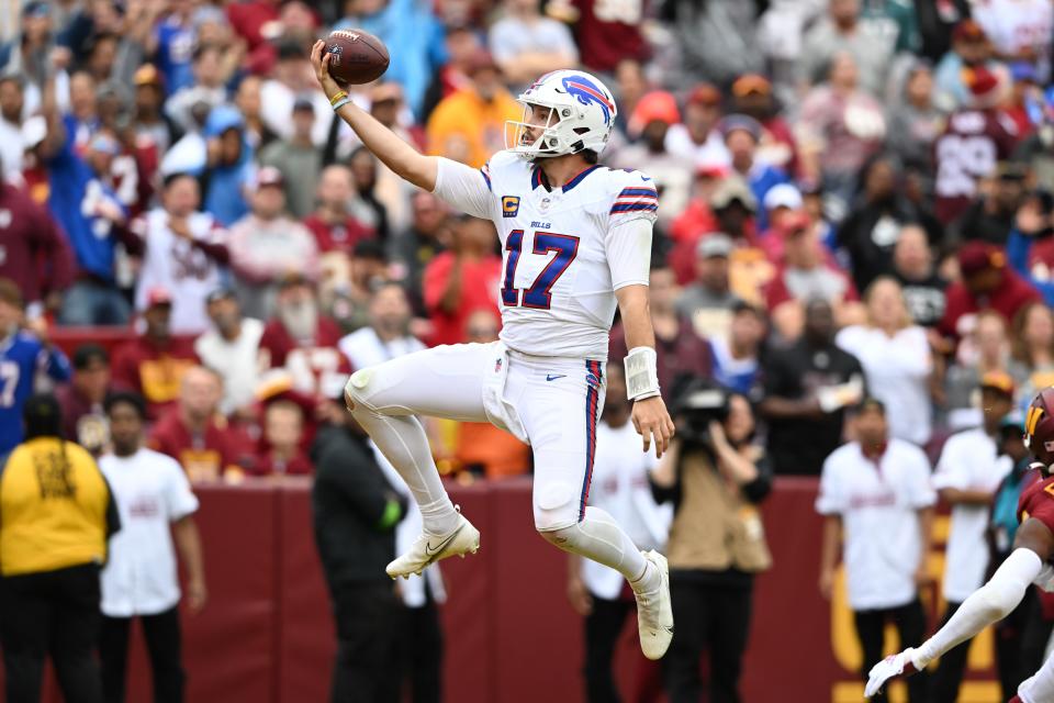 LANDOVER, MARYLAND - SEPTEMBER 24: Josh Allen #17 of the Buffalo Bills runs in for a touchdown during the fourth quarter of a game against the Washington Commanders at FedExField on September 24, 2023 in Landover, Maryland. (Photo by Greg Fiume/Getty Images)