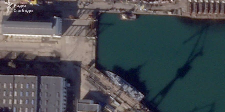 The ship Askold is still afloat, but its upper part is visibly damaged, satellite images show