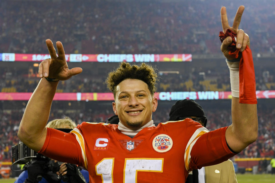 Kansas City Chiefs quarterback Patrick Mahomes celebrates after beating the Buffalo Bills overtime during an NFL divisional playoff football game, Sunday, Jan. 23, 2022 in Kansas City, Mo. (AP Photo/Reed Hoffmann)