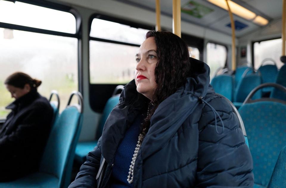 Mila Panchenko sits in a bus while returning to Hatfield  (REUTERS/Anna Gordon) (REUTERS)