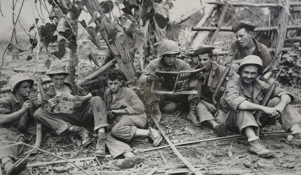 FILE - This Aug. 2, 1944 photo, courtesy of the U.S. Army Signal Corps, shows members of the famed WWII Army unit Merrill's Marauders less than 75 yards from enemy positions, on display during a gathering of remaining members, family and history buffs, in New Orleans. The unit that spent months marching and fighting behind enemy lines in Burma has been approved to receive the Congressional Gold Medal, Congress' highest honor. Nearly 3,000 soldiers began the unit's secret mission in Japanese occupied Burma in 1944. Barely 200 remained in the fight when their mission was completed five months later. (U.S. Army Signal Corps via AP, File)