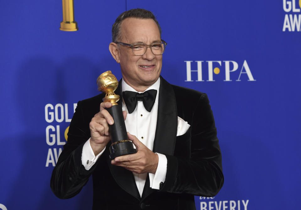 Tom Hanks, winner of the Cecil B. deMille Award, poses in the press room at the 77th annual Golden Globe Awards at the Beverly Hilton Hotel on Sunday, Jan. 5, 2020, in Beverly Hills, Calif. (AP Photo/Chris Pizzello)