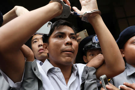 Reuters journalists Kyaw Soe Oo leaves after listening to the verdict at Insein court in Yangon, Myanmar, September 3, 2018. REUTERS/Ann Wang