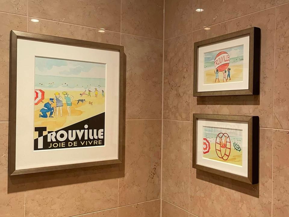 disney artwork in concierge room