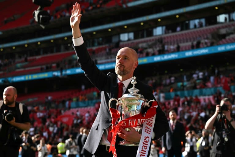 Erik ten Hag holds the FA Cup after <a class="link " href="https://sports.yahoo.com/soccer/teams/man-utd/" data-i13n="sec:content-canvas;subsec:anchor_text;elm:context_link" data-ylk="slk:Manchester United;sec:content-canvas;subsec:anchor_text;elm:context_link;itc:0">Manchester United</a> won the final 2-1 against <a class="link " href="https://sports.yahoo.com/soccer/teams/man-city/" data-i13n="sec:content-canvas;subsec:anchor_text;elm:context_link" data-ylk="slk:Manchester City;sec:content-canvas;subsec:anchor_text;elm:context_link;itc:0">Manchester City</a> on May 25 (Ben Stansall)