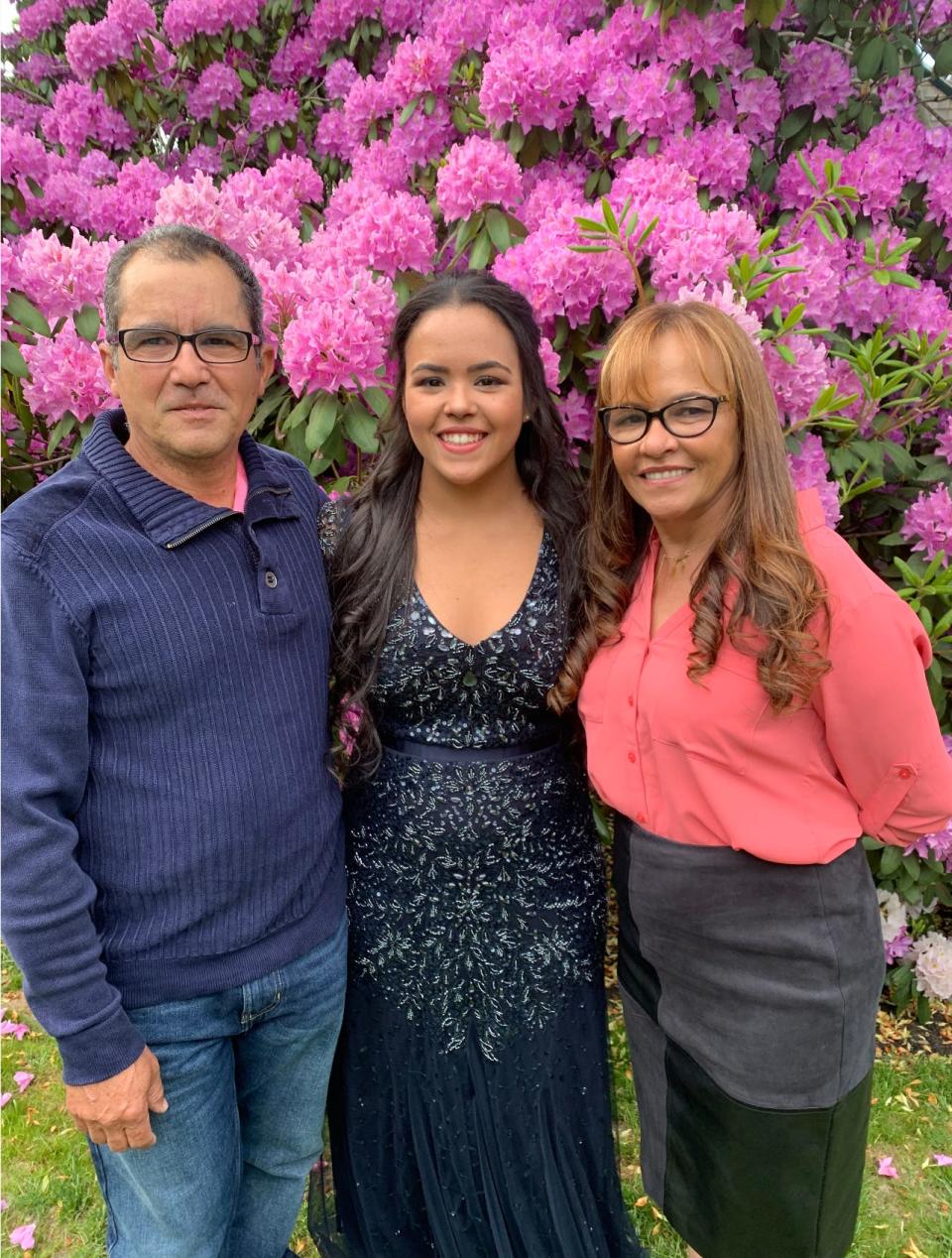 Tallya Maciel, center, with her father is Ecio Maciel and mother Antonia (Tuca) Maciel.