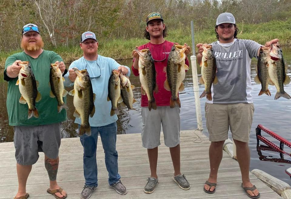 Left to right: Matthew Rittman, Brian Dutcher, Seth Slanker and Jackson Swisher had 43.11 pounds to win the Eighth Annual Toys for Tots 4-Man Team Open Tournament Dec. 5. at Lake Kissimmee.