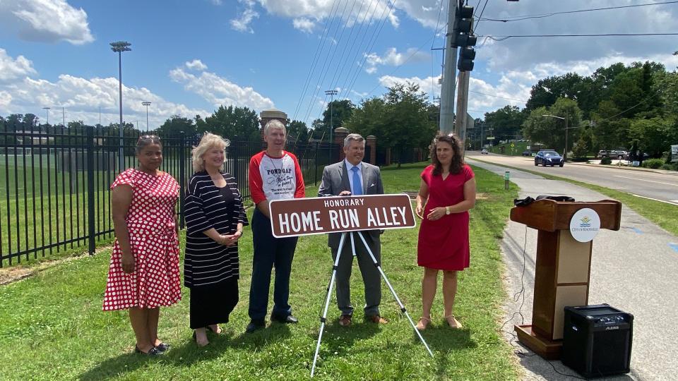 Honorary Home Run Alley street signs were dedicated on June 26, 2023, alongside Sutherland Avenue where the old Pond Gap baseball field was. From left are City Council members Amelia Parker and Lynne Fugate, David Williams of the Pond Gap Neighborhood Association, City Councilman Andrew Roberto, and Mayor Indya Kincannon.