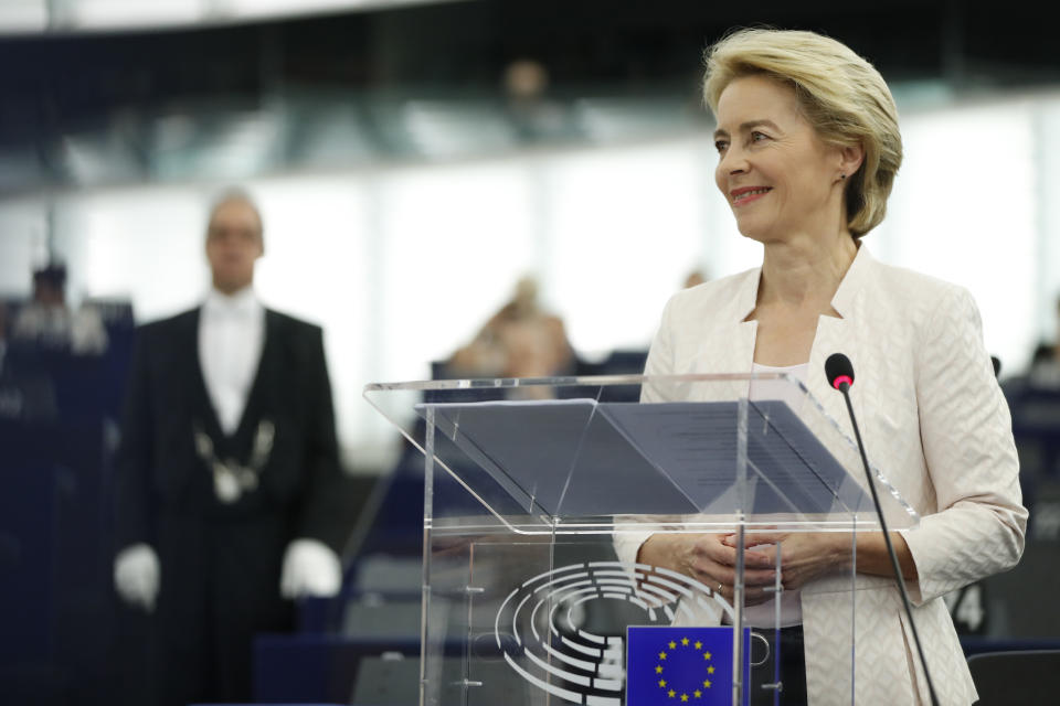 Germany's Ursula von der Leyen smiles as she delivers her speech at the European Parliament in Strasbourg, eastern France, Tuesday July 16, 2019. Ursula von der Leyen outlined her vision and plans as Commission President. The vote, held by secret paper ballot, will take place later today. (AP Photo/Jean-Francois Badias)